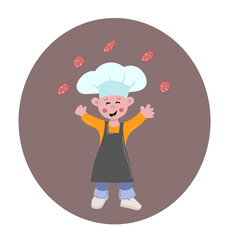 Happy cute little boy in chef costume 
