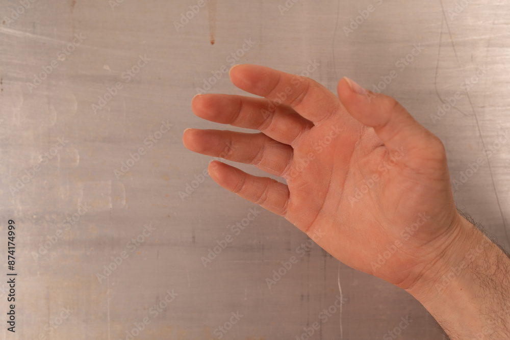 Poster An open palm reaching towards the viewer