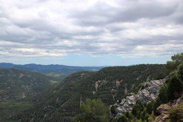 Mountains of El Maestrazgo, Castellón, Spain, rugged, rocky, colorful, and with trees