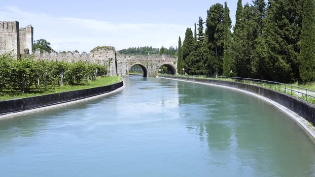 the Visconteo Bridge in Borghetto sul Mincio Visconteo is a fortified dam that was built in 1393 and completed in 1395 at the behest of the Duke of Milan Gian Galeazzo Visconti.
