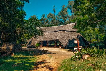 A dried palm tree leaves roofed structure at Haller Park in Bamburi, Mombasa, Kenya  
