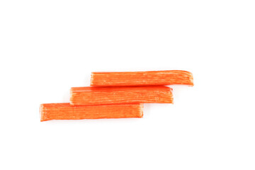 Crab sticks on a white background. Eaten with wasabi. Crab sticks have a lot of selenium and phosphorus. Helps in the work of blood vessels. Stimulating proteins associated with cancer prevention.