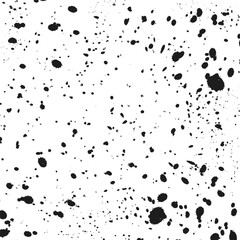 Abstract texture of black mascara splashes on a white background.