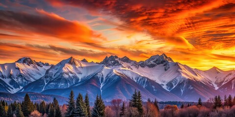 Obraz premium Vibrant sunset casting warm hues over snow-capped mountains, sunset, mountains, orange sky, scenic, landscape, nature
