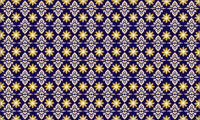 Thai applied ethnic pattern in golden yellow with floral patterns on a dark blue background.