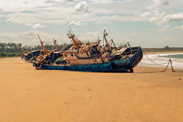 An abandoned ship on the beach at Malindi Beach in Malindi Town, Kenya
