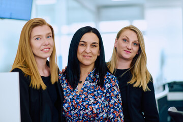 Group of Businesswomen in Modern Office Setting.