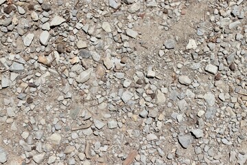 A close view of the rock and pebble gravel ground surface.