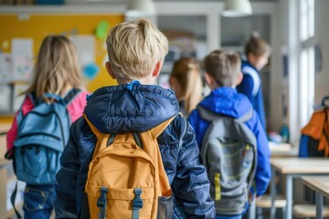 A group of students walk into a classroom with their backpacks, ready to begin a new school year.