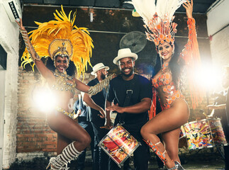 Performance, musician and samba dancer for festival, costume and carnival for traditional fashion. Feathers, Mardi Gras or cultural Brazilian people for entertainment, concert or local show with band