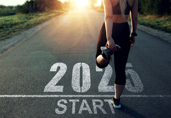 New Year 2025 with new ambitions, challenge, plans, goals and visions.Sports girl who wants to start the year 2025. Concept of new professional achievements in the new year and success.	
