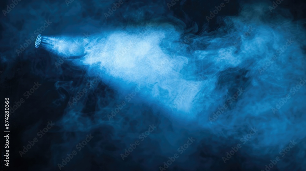 Aufkleber a blue spotlight shining through a thick cloud of smoke, creating a mysterious and captivating visua