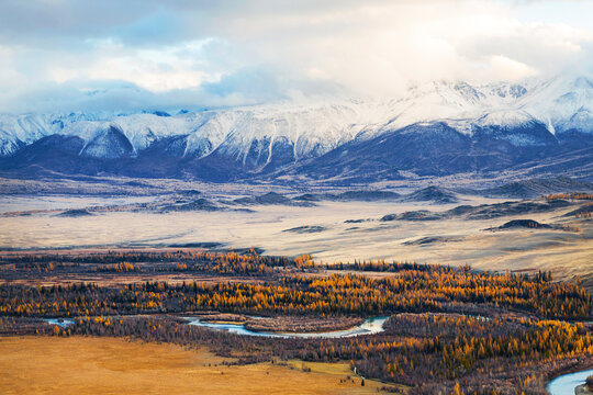 Kurai steppe, the Chuya river and the North Chuya ridge in autumn at sunset. Altai Republic, Russia