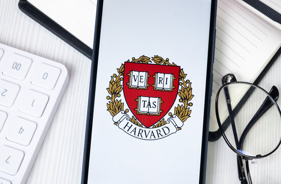 New York, USA - 30 June 2024: Harvard Logo or Icon on Phone Screen
