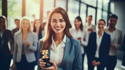 Happy female leader receives business award With a cheerful team of employees cheering behind you.