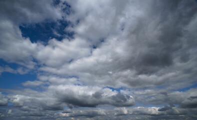 dark dramatic sky with stormy clouds before rain as abstract background, extreme weather
