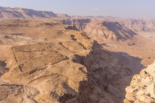 The panorama view of the archeological cite in the desert by old Masada national park in the eastern part of Israel.
