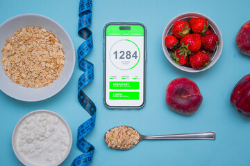 Calorie counting application on the screen of a modern smartphone. Taking care of your diet and eating healthy