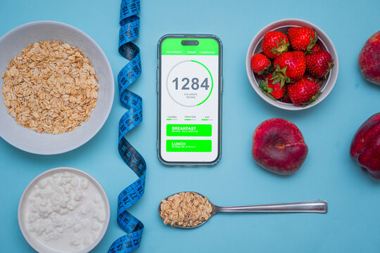 Calorie counting application on the screen of a modern smartphone. Taking care of your diet and eating healthy