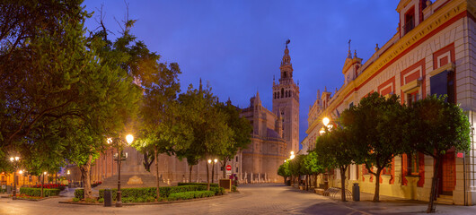 Famous Bell Tower Giralda and Cathedral Saint Mary of the See at night, Seville, Andalusia, Spain