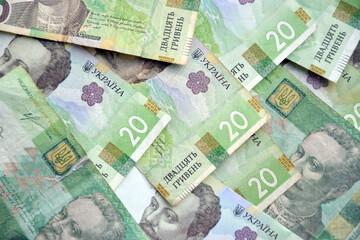 Processed collage of Ukrainian Hryvnia UAH bills banknotes texture. Background for banner