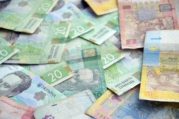 Processed collage of Ukrainian Hryvnia UAH bills banknotes texture. Background for banner