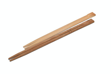 Two sets of wooden chopsticks lie on a white background.