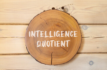IQ intelligence quotient symbol. Concept words IQ intelligence quotient on beautiful wooden circle....