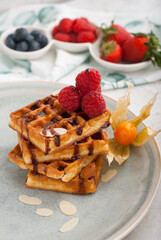 Belgian waffles with chocolate and fruit