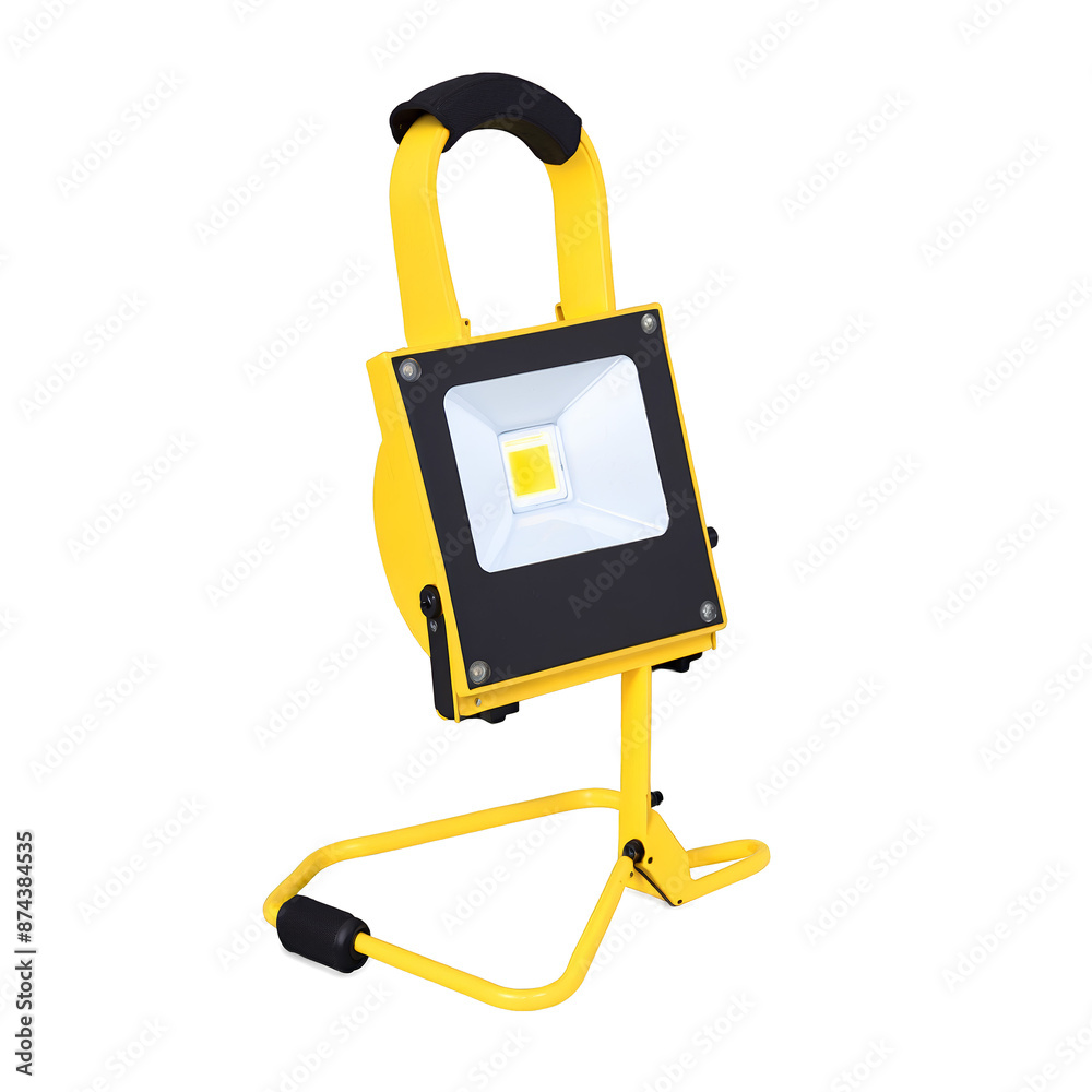 Poster A compact portable flood light with a foldable handle and a square shape featuring a dimmer switch for adjusting the intensity of its warm yellow light..