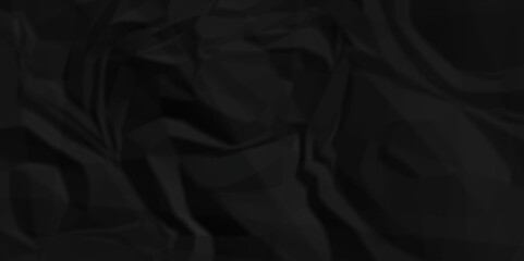 Dark black wrinkly backdrop paper background. panorama craft wrinkly paper texture background, crumpled pattern texture.	
