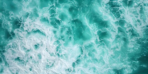 Obraz premium Abstract Natural Background Aerial View of Turquoise Ocean Water Splashes. Concept Aerial Photography, Abstract Nature, Ocean Views, Turquoise Water, Splashing Waves