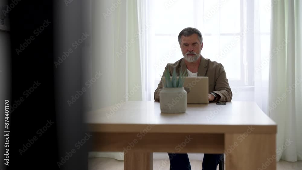 Canvas Prints Mature businessman ceo trader using computer, typing, working in modern office, doing online data market analysis, thinking planning tech strategy looking at laptop with copy space.