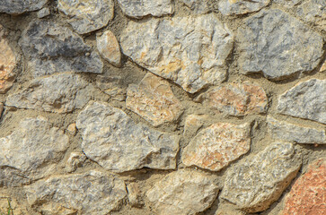 Wall of stones as a texture for background