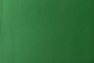 Texture of genuine leather, artificial leatherette green background