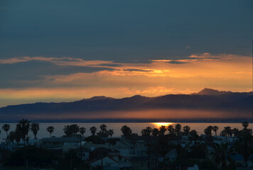 Sunset Over Mountains and Ocean