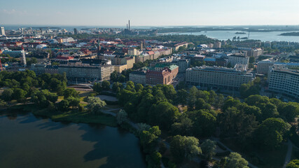 Fototapeta premium Helsinki city capital fo Finland. These drone photos capture the beautiful city of Helsinki from the sky, showcasing its stunning architecture, vibrant cityscape, and the harmonious blend of modernity