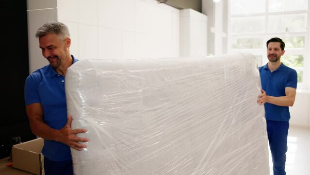 Two male professional movers