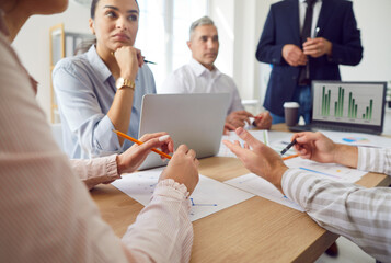 Office diverse business workgroup, team with leader discuss paperwork at desk, financial report statistical data, forecasting working on new common project, brainstorming, briefing activity, workshop