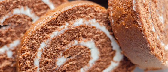 A slice of chocolate cake with white frosting