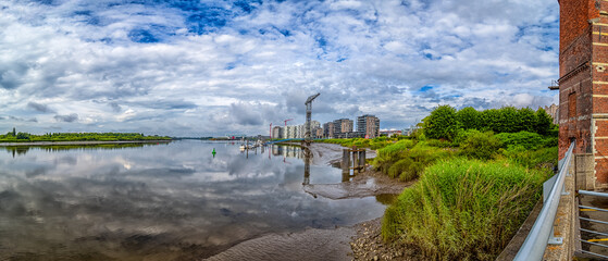 Schelde (River) - Riverfront View With Crane and Buildings