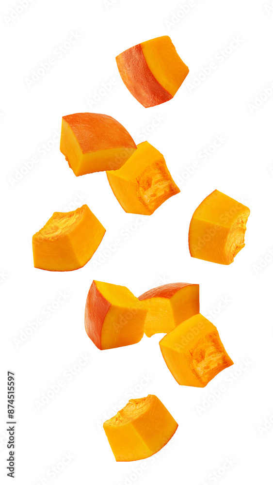 Wall mural falling piece of pumpkin, cubes, isolated on white background, full depth of field