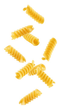 Falling raw Fusilli, Rotini, uncooked Italian Pasta, isolated on white background, full depth of field