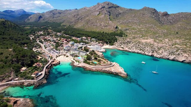 Amazing best beaches of Mallorca (Majorca) island. Cala Clara and cala Carbo in northern part. Aerial drone video of two beaches , resort and turquoise clear sea. Spain< Balearic islands