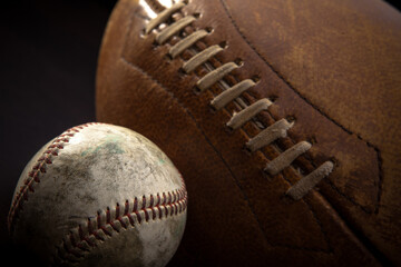 High-Resolution Close-Up of a Very Used Baseball and American Football in 4K Ultra HD
