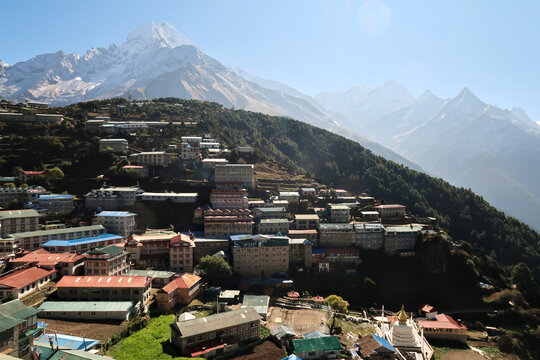 View over Namche Bazar, Bazaar, mountains are rising in the background, Mount Kanguru, Kangguru on the right and Mount Thamserku on the left, Mount Everest Base Camp Trek, EBC, Nepal