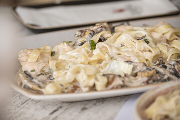 Delicious tagliatelle served on a ceramic plate