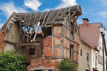 Fototapeta premium Destroyed roof of an old house