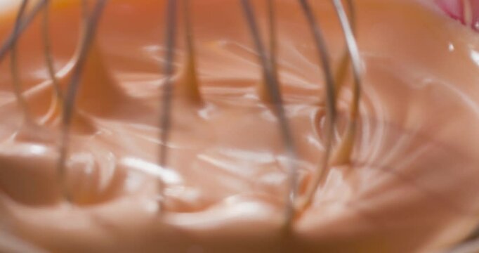   Whipping the orange cream with the whisk in the food processor until ready.
