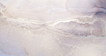 A close-up photograph of a white and gray abstract ink swirl with delicate texture